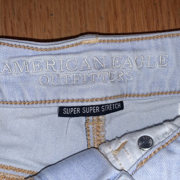 American Eagle Super Super Stretch Distressed Midi Shorts 00 - Picture 3 of 8